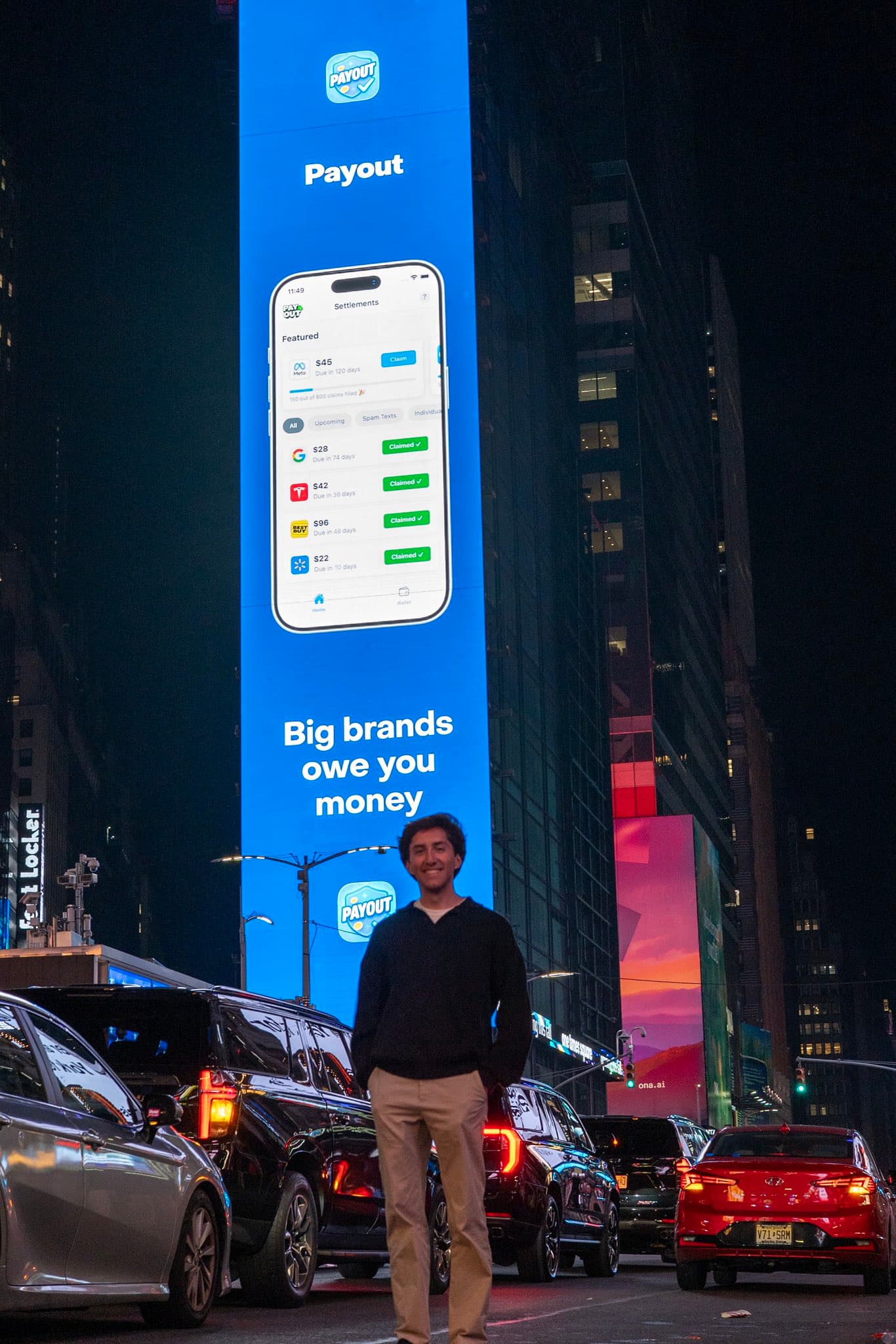 A submitted app displayed on a giant digital billboard in New York City.